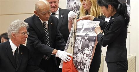 It’s a miracle, say family of Japanese soldier killed in WWII, as flag he carried returns from US